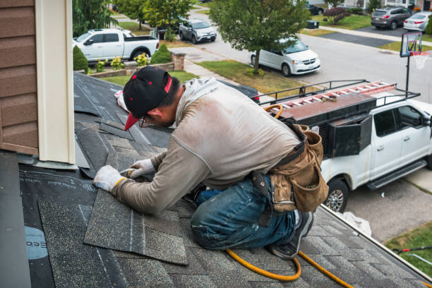 Professional Roofing technician working in Leicester, MA